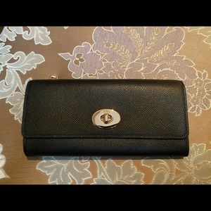 Brand new Coach long black wallet/pouch